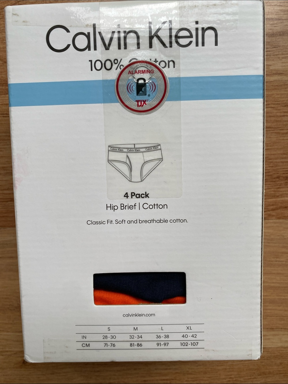 Calvin Klein Classic Fit Cotton Hip Briefs White, Teal, Navy, Orange NWT large - Picture 2 of 2